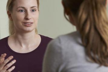 patient talking to mental health professional